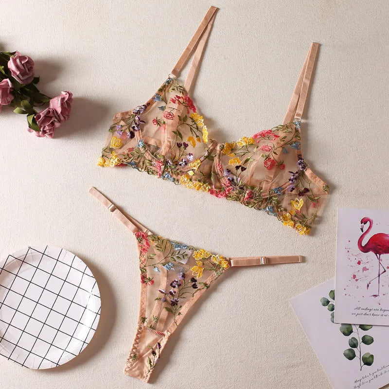 Floral patterned mesh bra and underwear set with a steel ring detail on the bra, shown in purple.