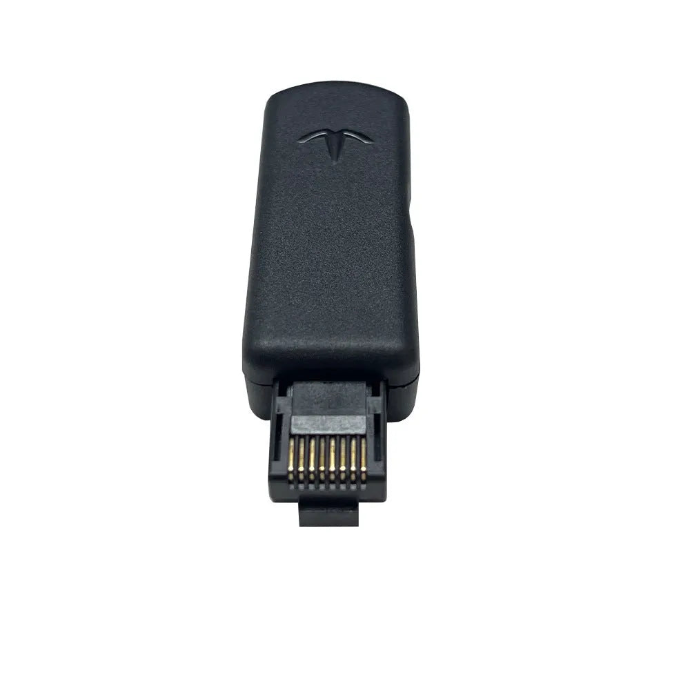 Black JB Tool USB adapter for PlayStation 5 with aluminium alloy casing and Ethernet port.