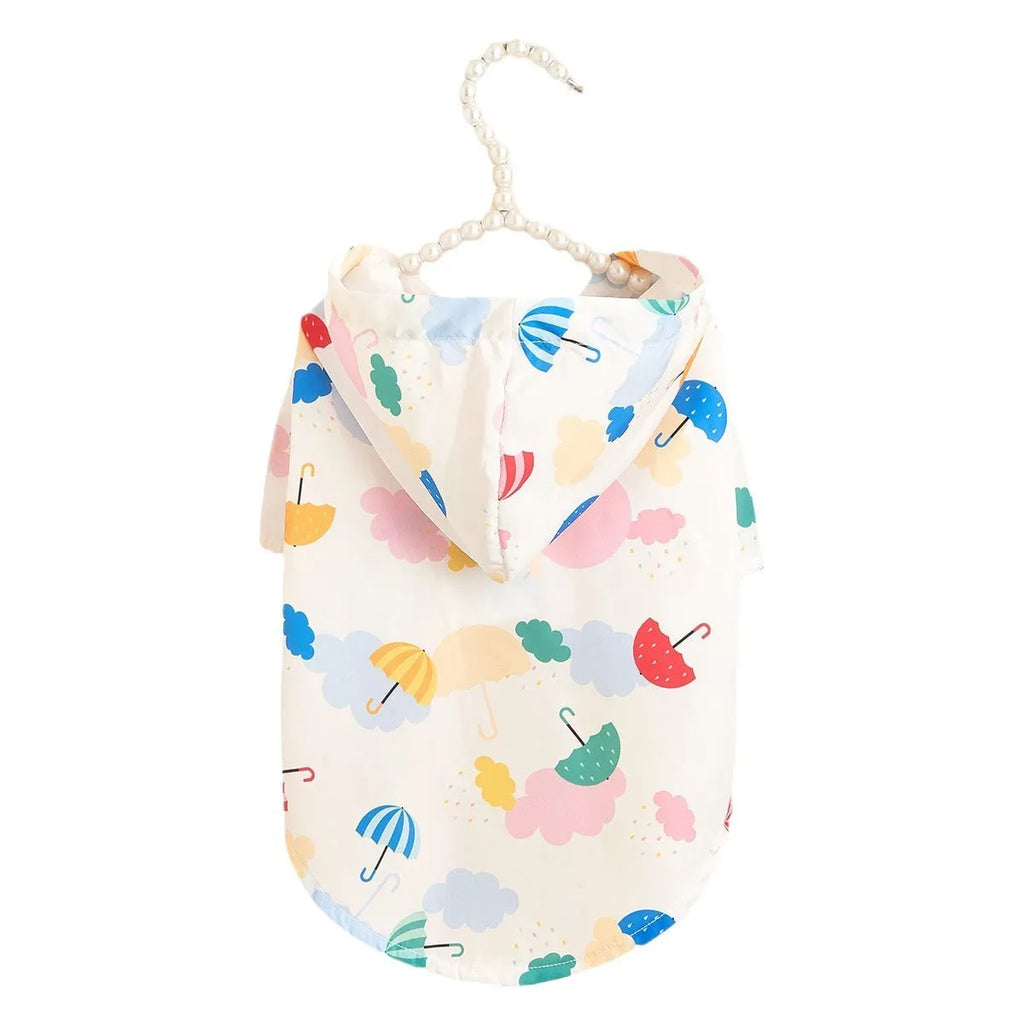 Colourful cartoon umbrella pattern dog raincoat made from polyester fabric.