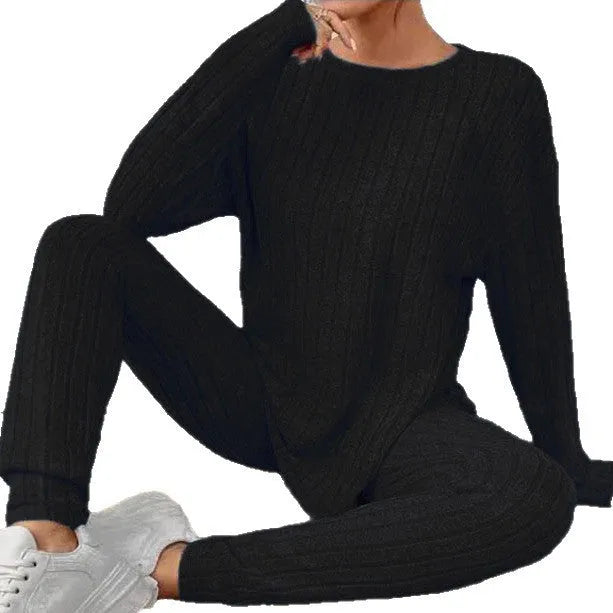 Women's black sunken stripe two-piece lounge set with regular sleeves and matching trousers