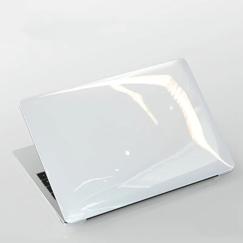 Transparent and black PC hard shell protective case for MacBook Pro 14.2 and 16.2 inch laptops.