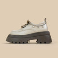 White platform Mary Jane leather shoes with chunky heel and lace-up closure