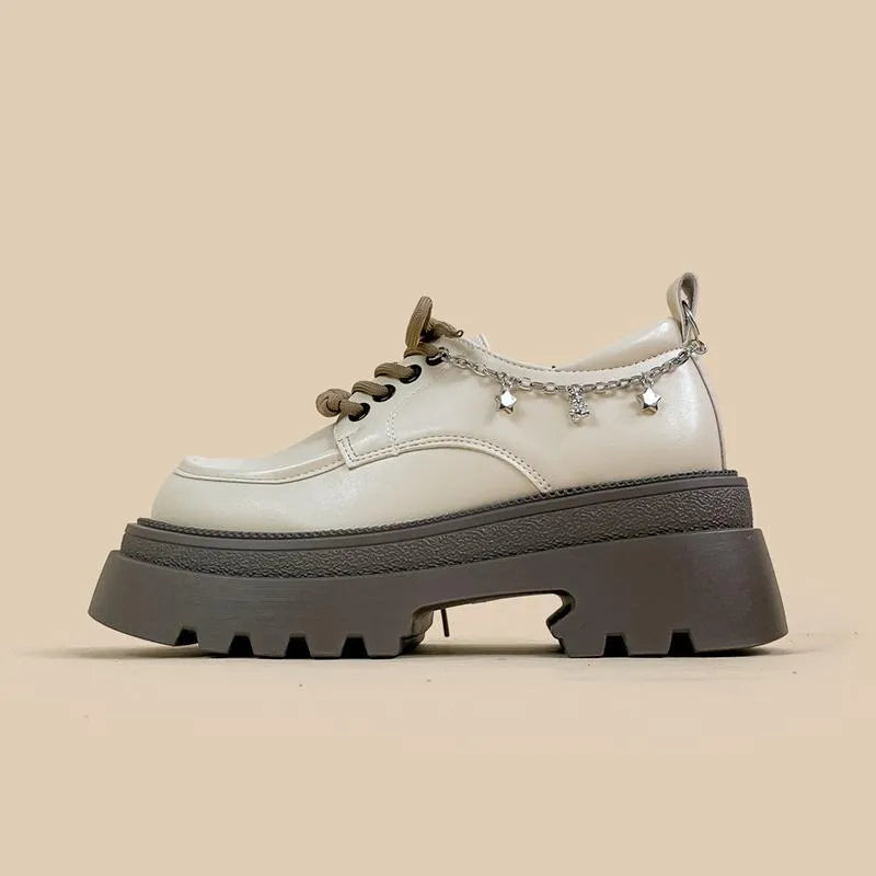 White platform Mary Jane leather shoes with chunky heel and lace-up closure