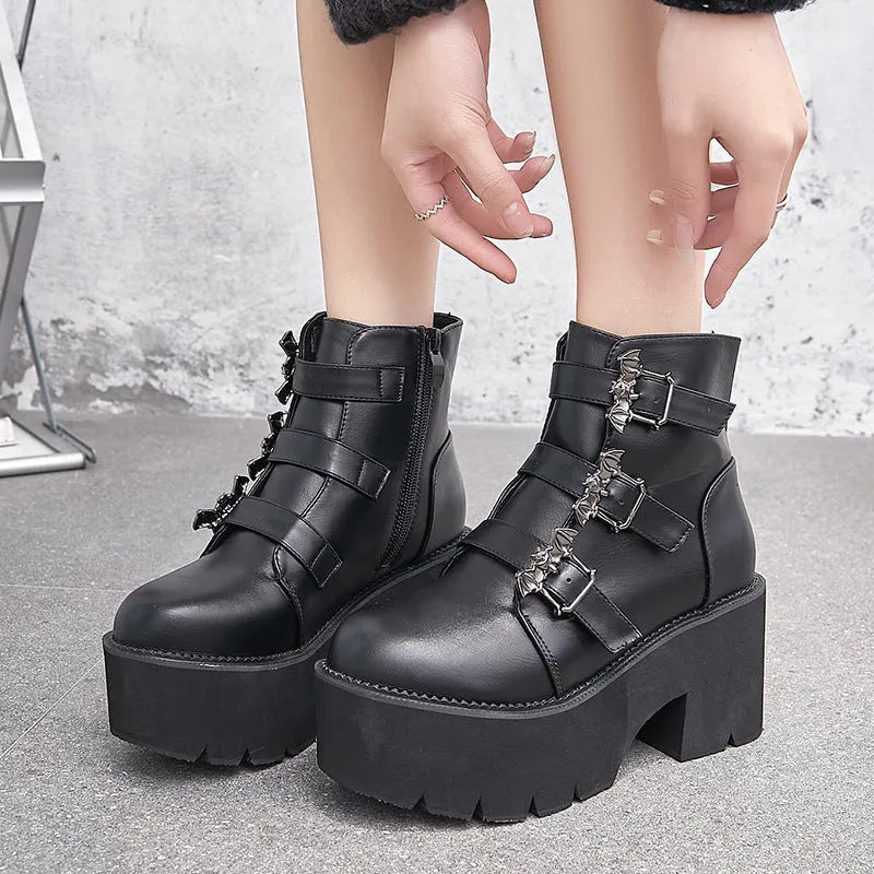 Black women's Harajuku punk gothic Martin boots with bat buckle, platform sole, and side zip.