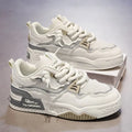 Men's low top white casual shoes with rubber sole and mesh lining in beige, black, or white and yellow.