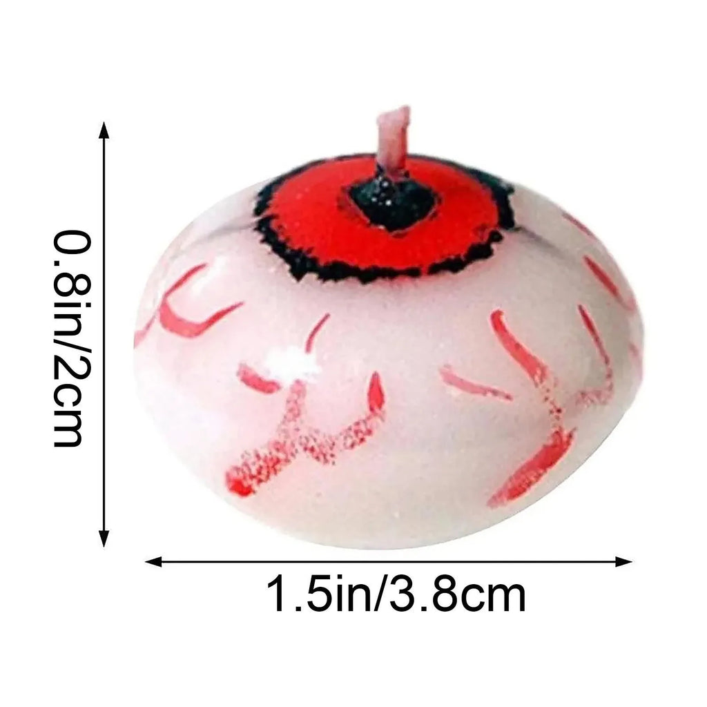 Red oval eyeball floating Halloween candle made from paraffin wax
