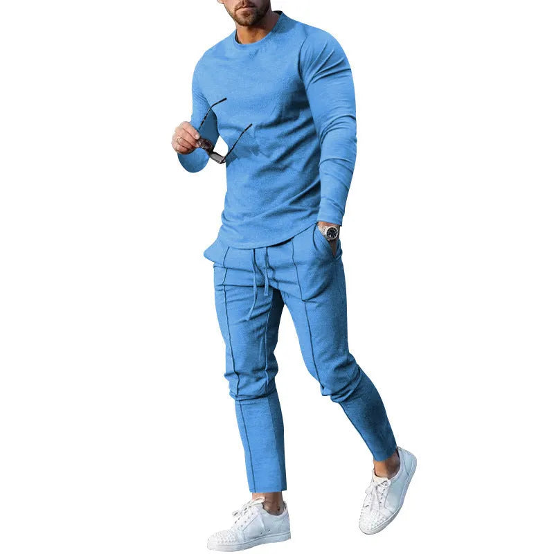 Men's light grey two-piece casual suit with long sleeve T-shirt and trousers on a hanger.