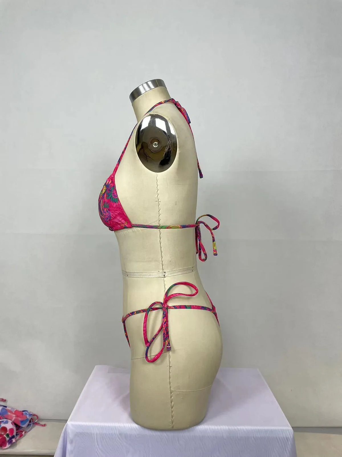 Pink printed two-piece bikini set in nylon with 22% lining, sizes S to XL