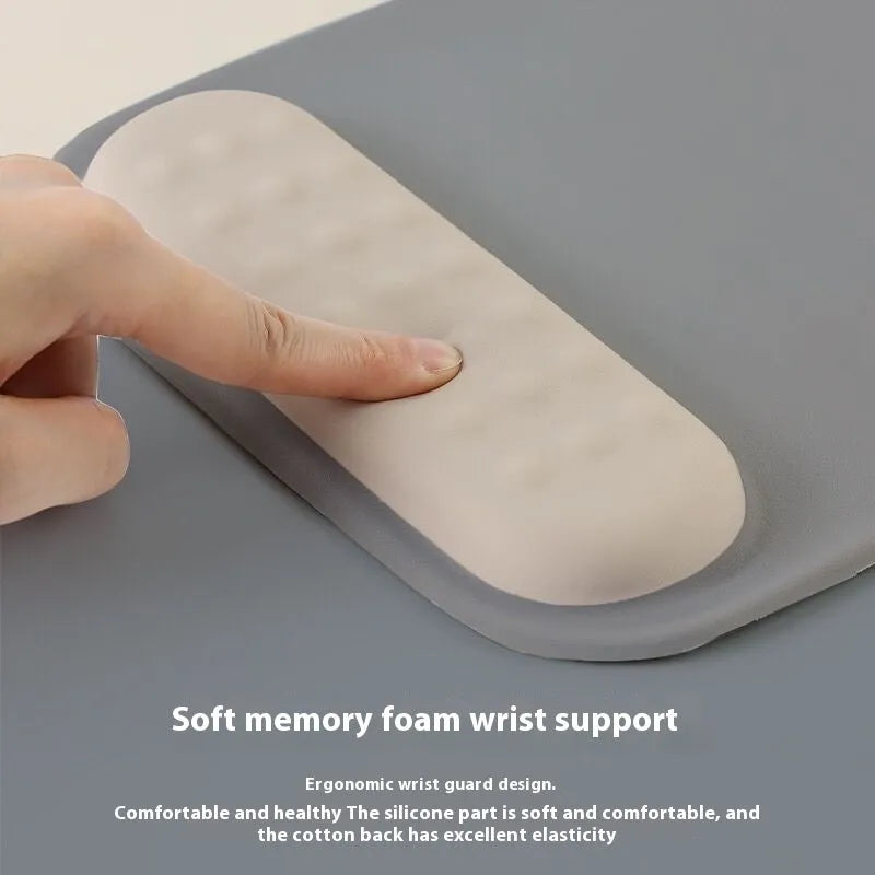 Ergonomic cloth silicone mouse pad with wrist rest in multiple colour options.