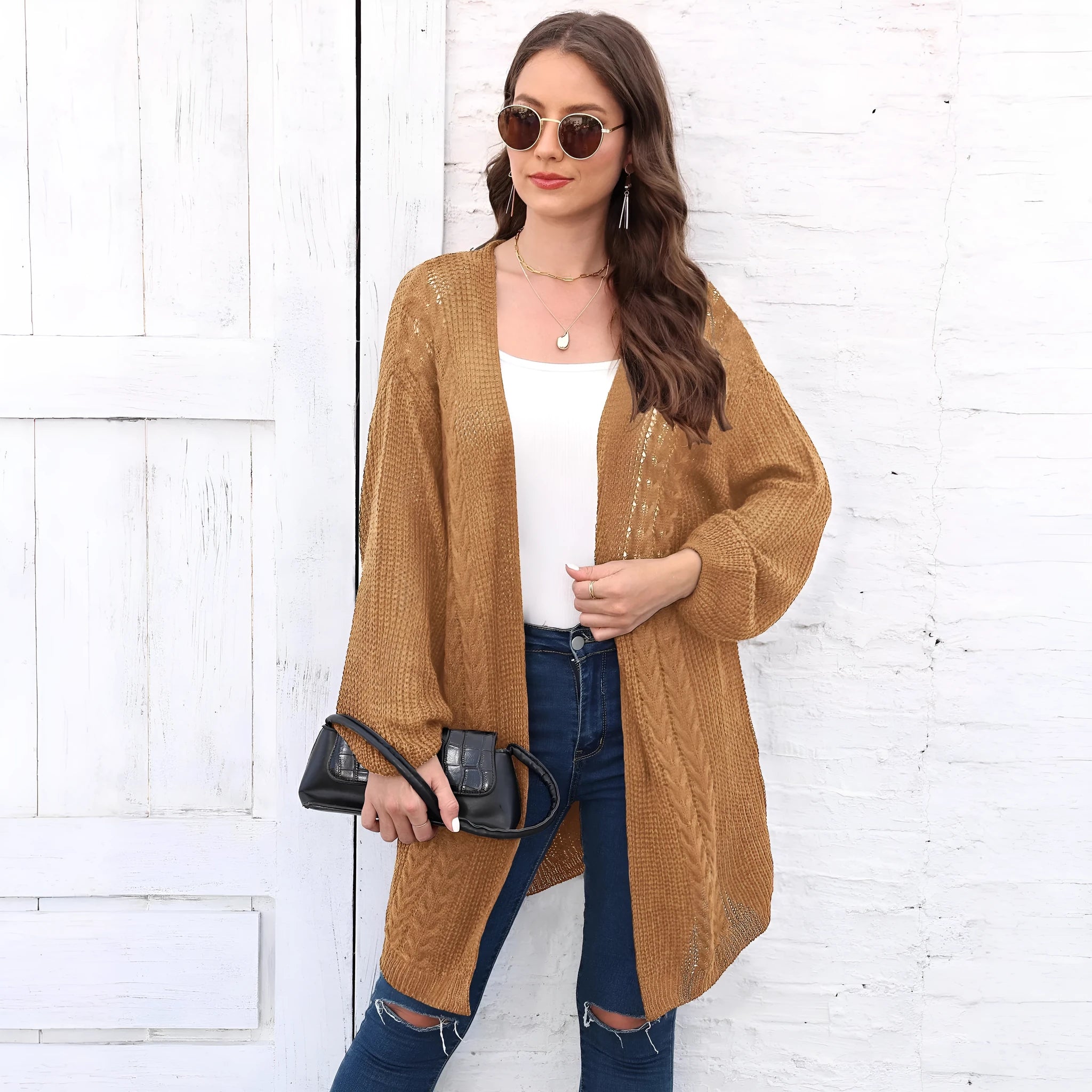 Women's loose fit acrylic sweater coat in solid colour with European styling