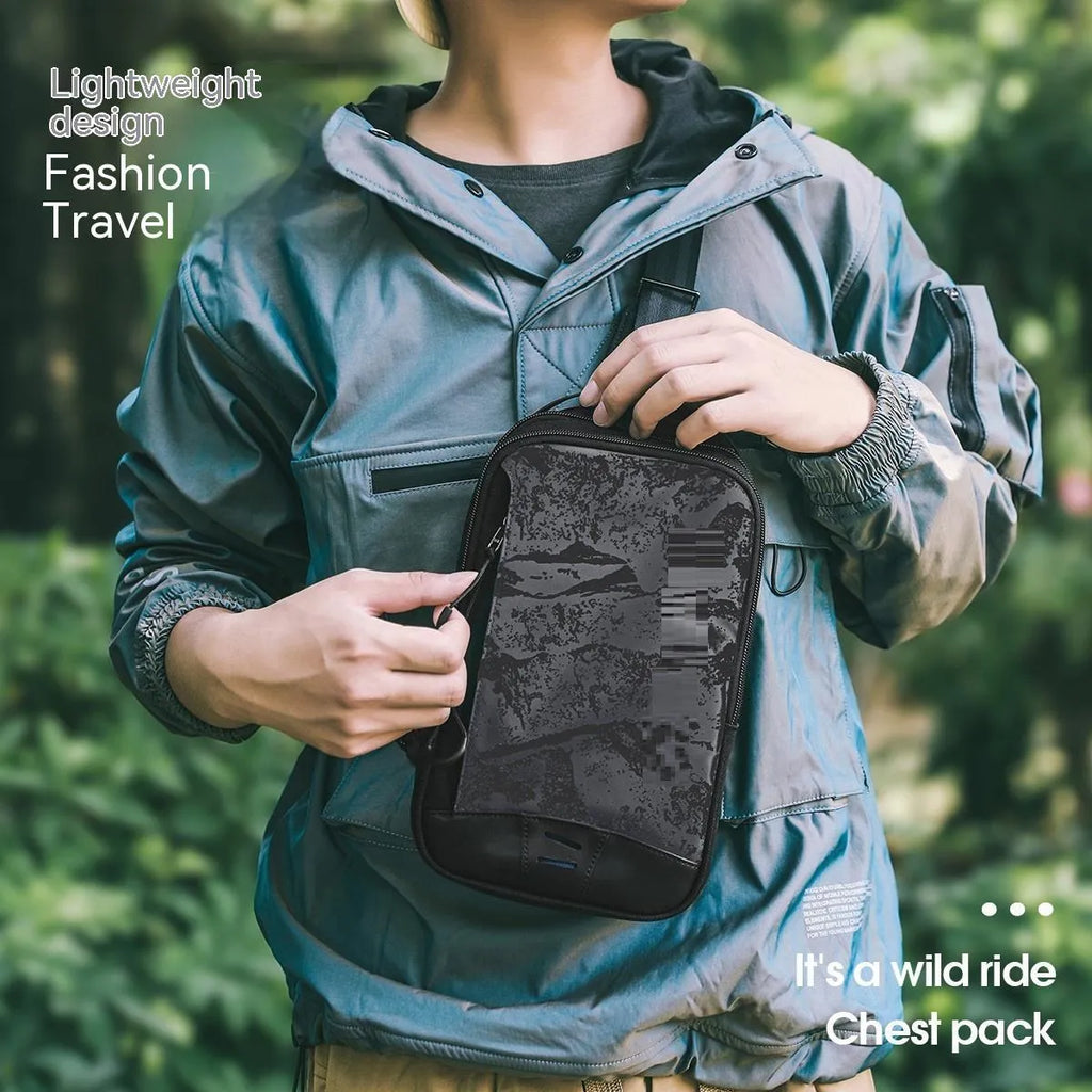 Black camouflage chest bag with single shoulder strap showing waterproof TPU construction and mobile phone compartment