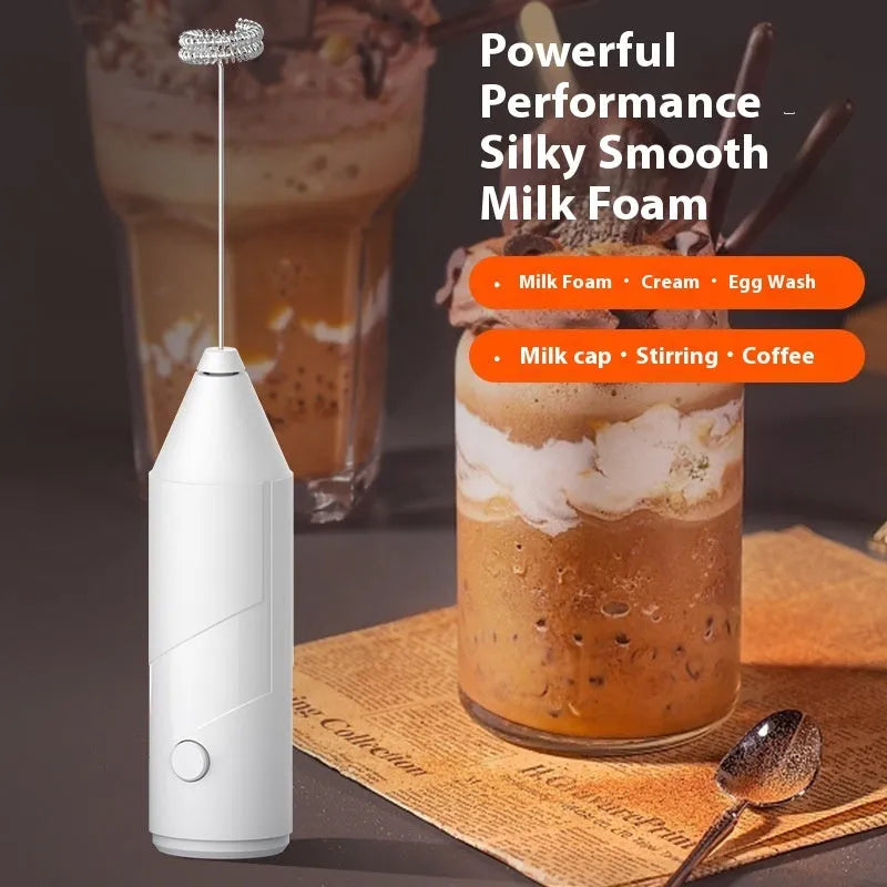 Handheld milk frother with stainless steel whisk in black, white, and khaki colour options