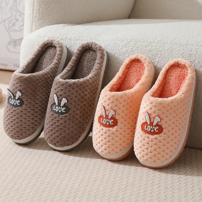 Women's rabbit plaid artificial fur house slippers with a thick rubber non-slip sole in a selection of colours.