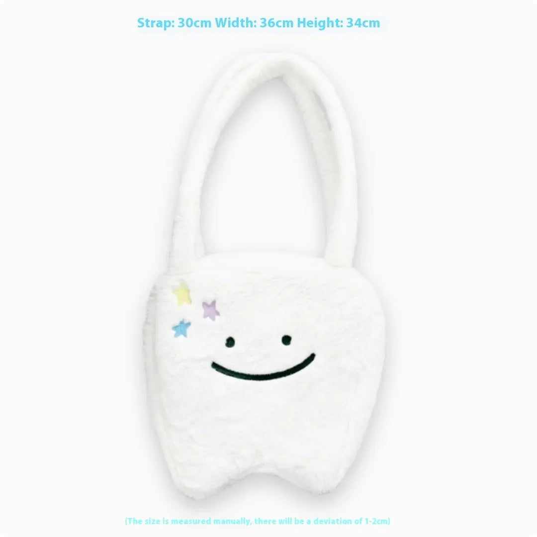 White plush tote bag with cute tooth pattern, zipper closure, and shoulder strap