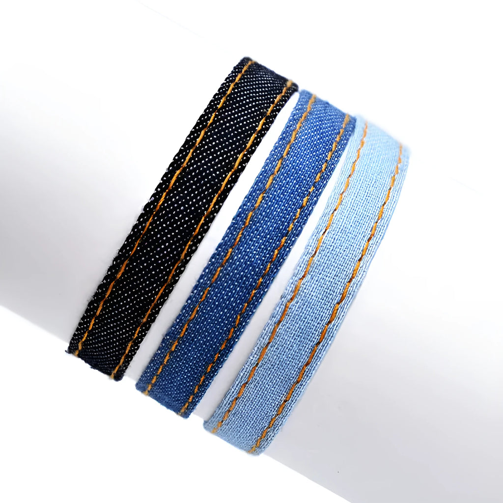 Handcrafted denim fabric bracelet strap in mixed materials for unisex travel and memorial use