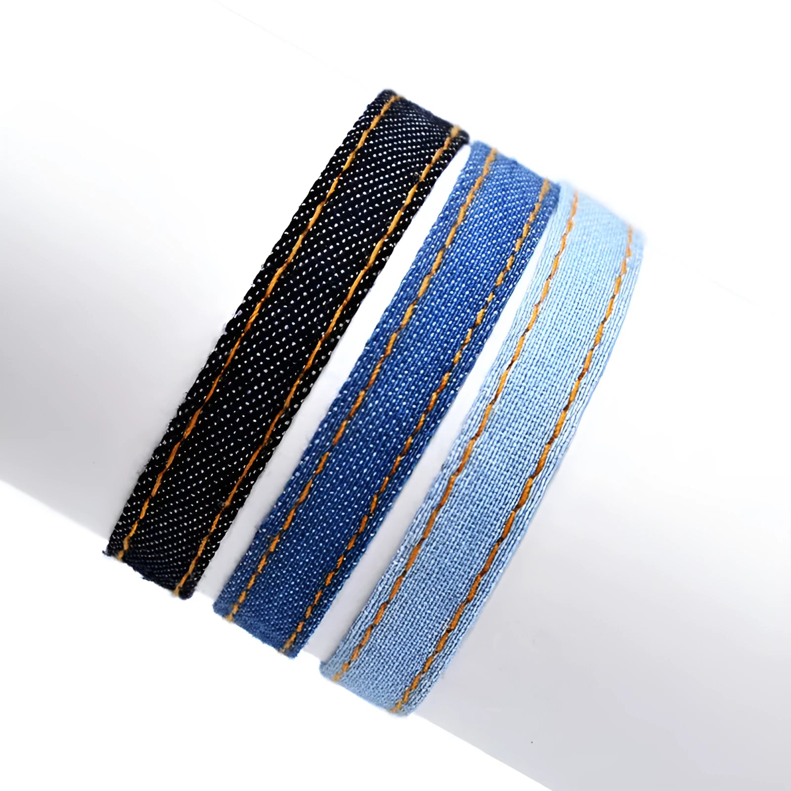 Handcrafted denim fabric bracelet strap in mixed materials for unisex travel and memorial use
