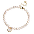 Women's freshwater pearl bracelet with fan-shaped design showing elastic and chain fastening options