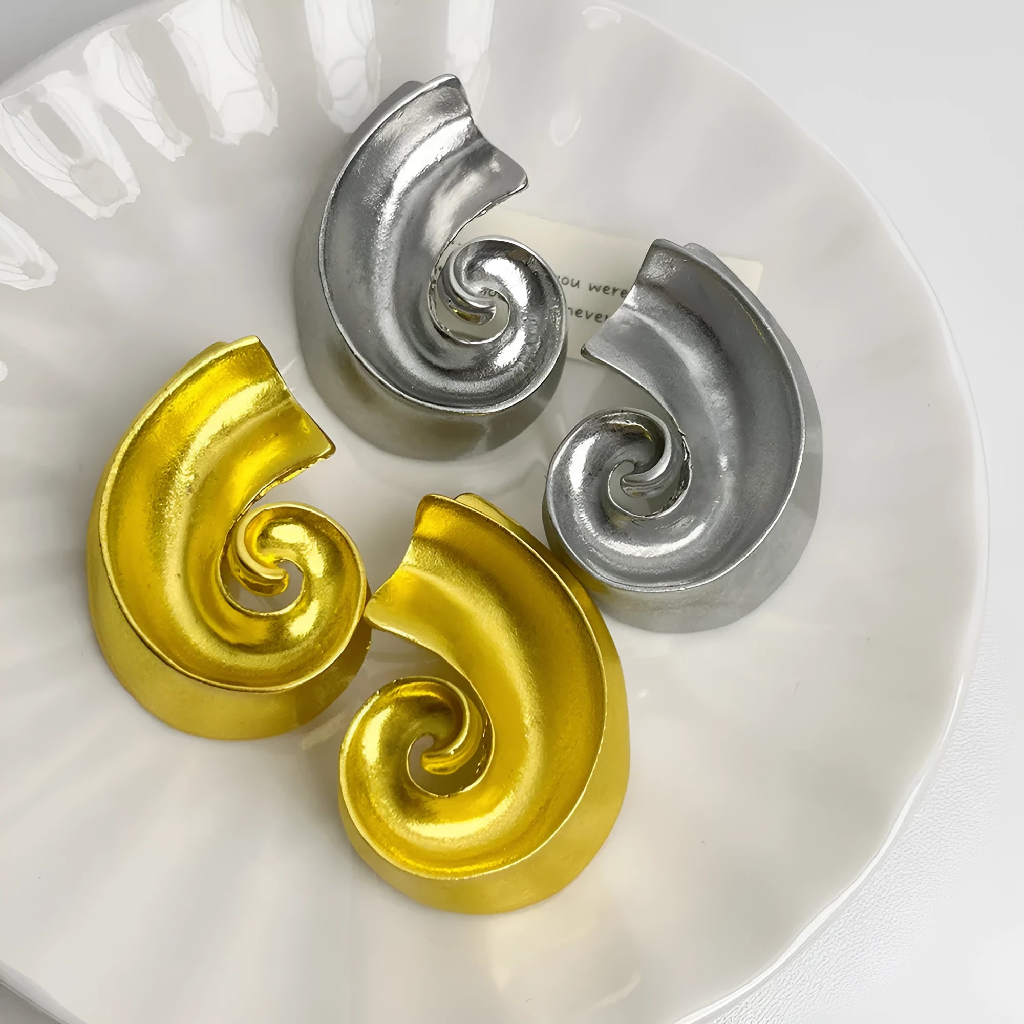 Geometric ear studs with 5cm drop length in gold or silver electroplated finish