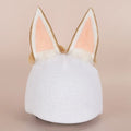Plush fabric ski helmet decoration hat featuring a colourful cartoon design, shown on a helmet.