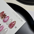 Hand-painted three-dimensional nail patches with embossed candy patterns in almond shape