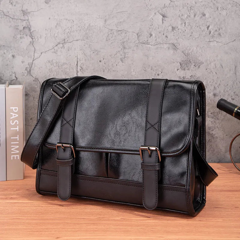 Black Korean-style men's commuter backpack with anti-theft function and PU material construction.