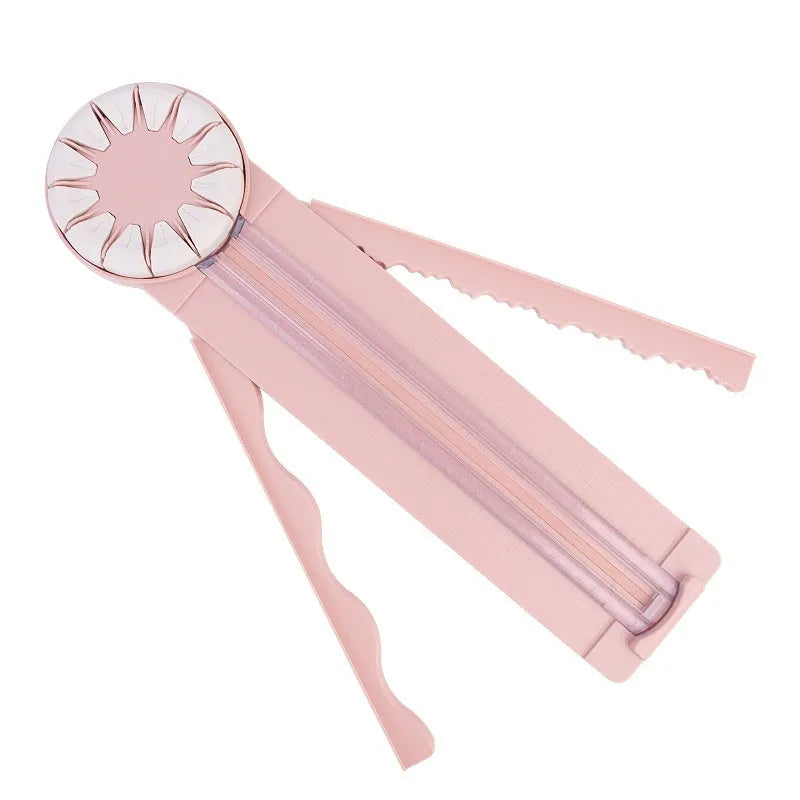 12-in-1 plastic paper cutting machine with dotted cutter measuring 46.2cm long in pink and black colour options