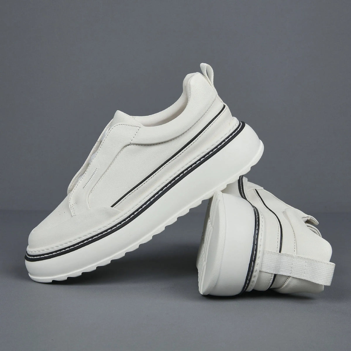 Black breathable first layer cowhide slip-on sneaker with elastic band foam sole low top platform mid heel round toe