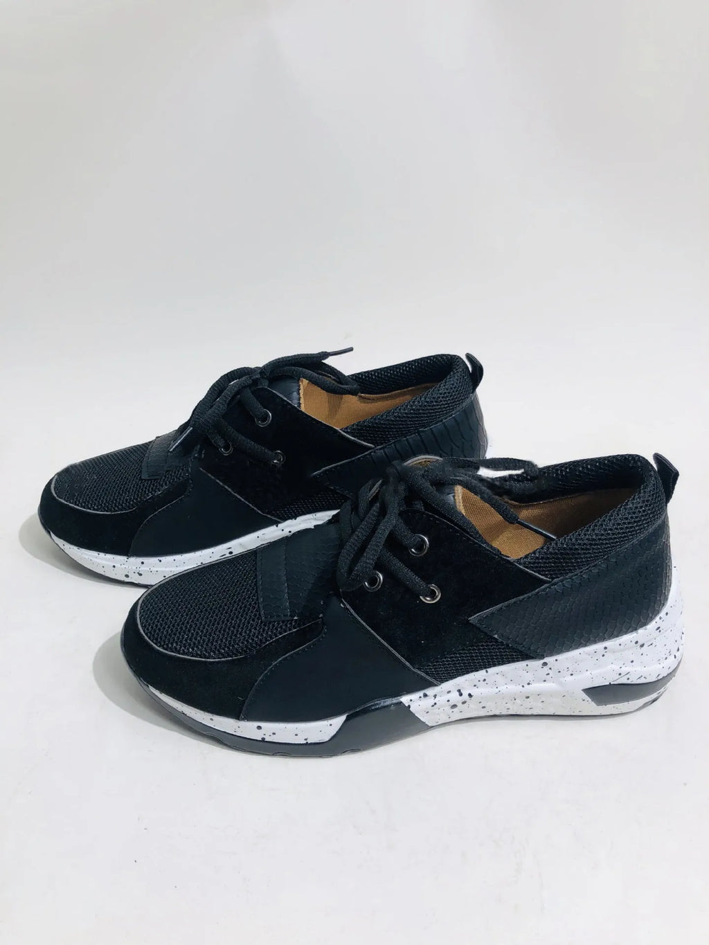 Women's lightweight casual sneakers with suede upper and wedge heel in multiple colours.