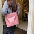 Corduroy one-shoulder bag in pink or brown showing dimensions and PU lining interior