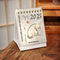 Mini 2025 desk calendar set showing four different themed designs including coffee and motivational messages.