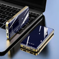 Mirror digital display power bank showing battery percentage, available in five colours.