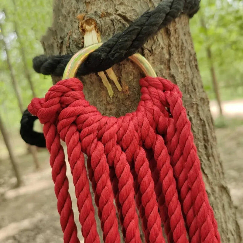 Nylon rope mesh hammock suspended outdoors showing 1.1m width and open construction