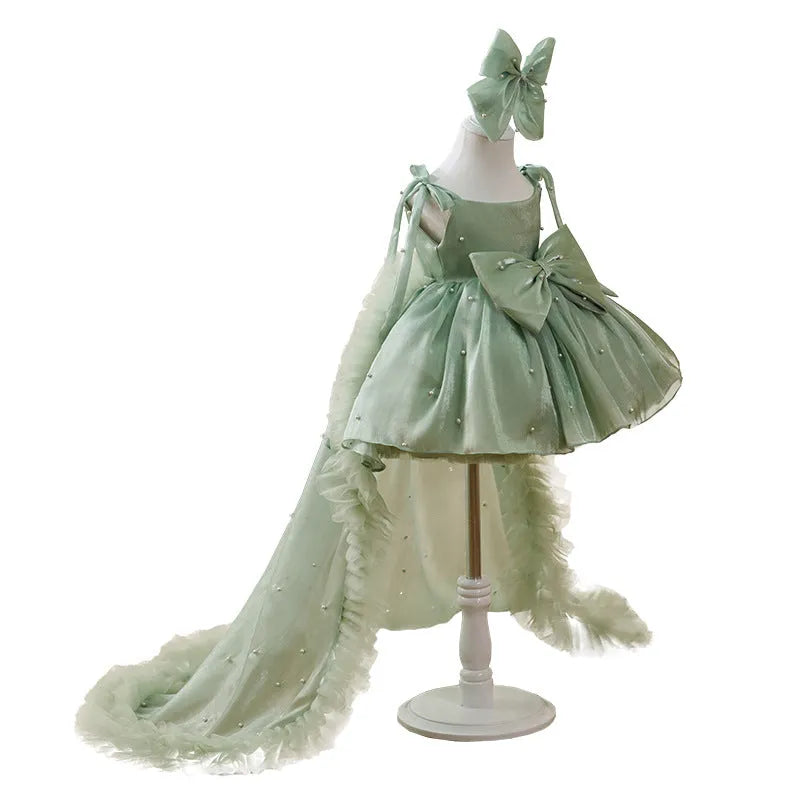 Green large trailing mesh children's dress on display, suitable for heights 80cm to 160cm, polyester fibre construction.