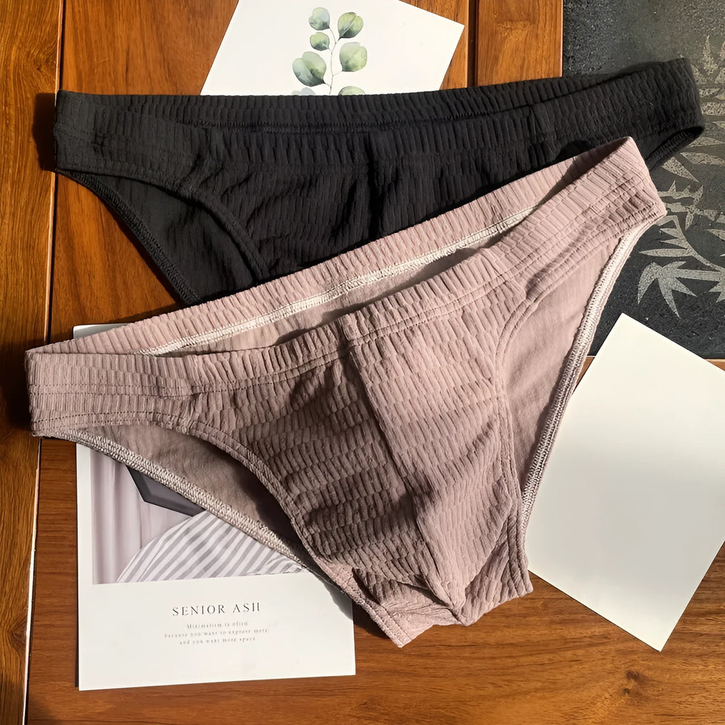 Men's pure cotton triangle briefs in solid colours showing mid-waist design