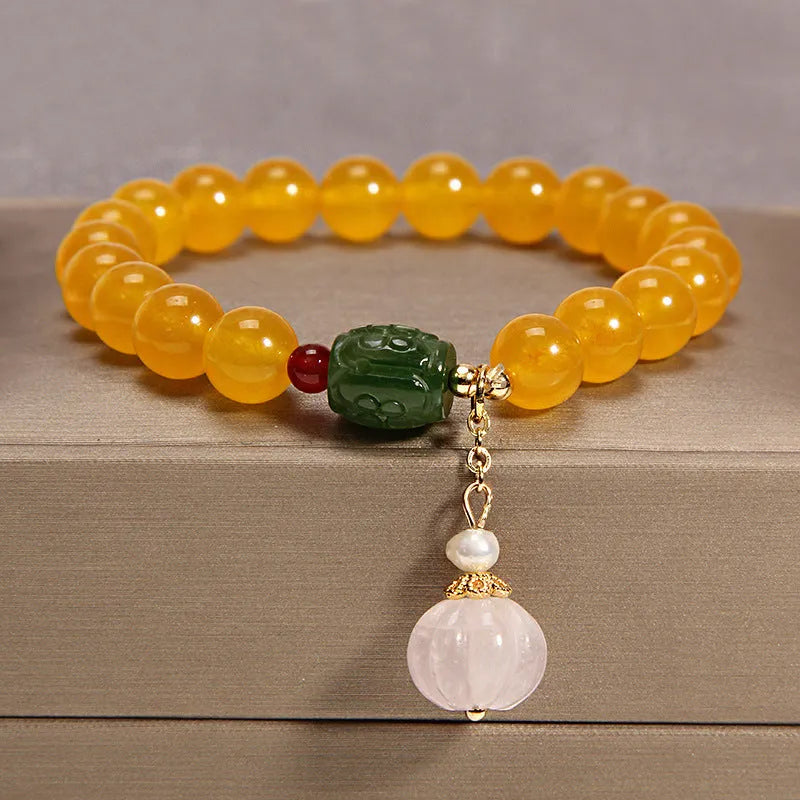 Yellow agate crystal bracelet with gold silk thread and adjustable sliding knot closure