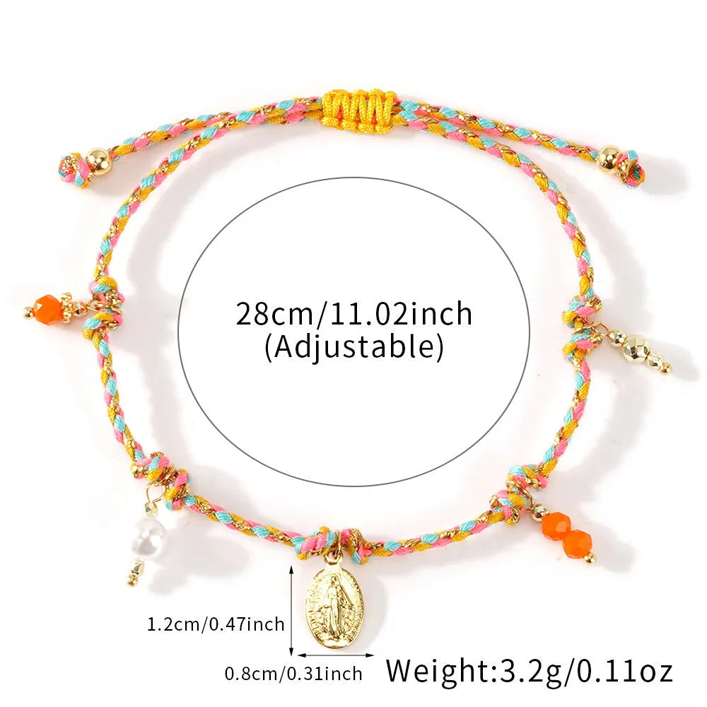 Close-up of a colourful hand-woven braided rope bracelet styled as an ethnic accessory for women.
