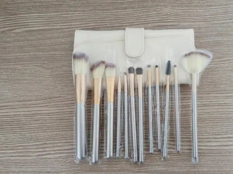 Set of rice white Persian hair make-up brushes with champagne-colour handles, available in 12, 18, or 24 pieces