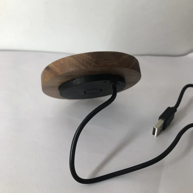Black 60mm round wireless phone charger for embedded desk and table installation