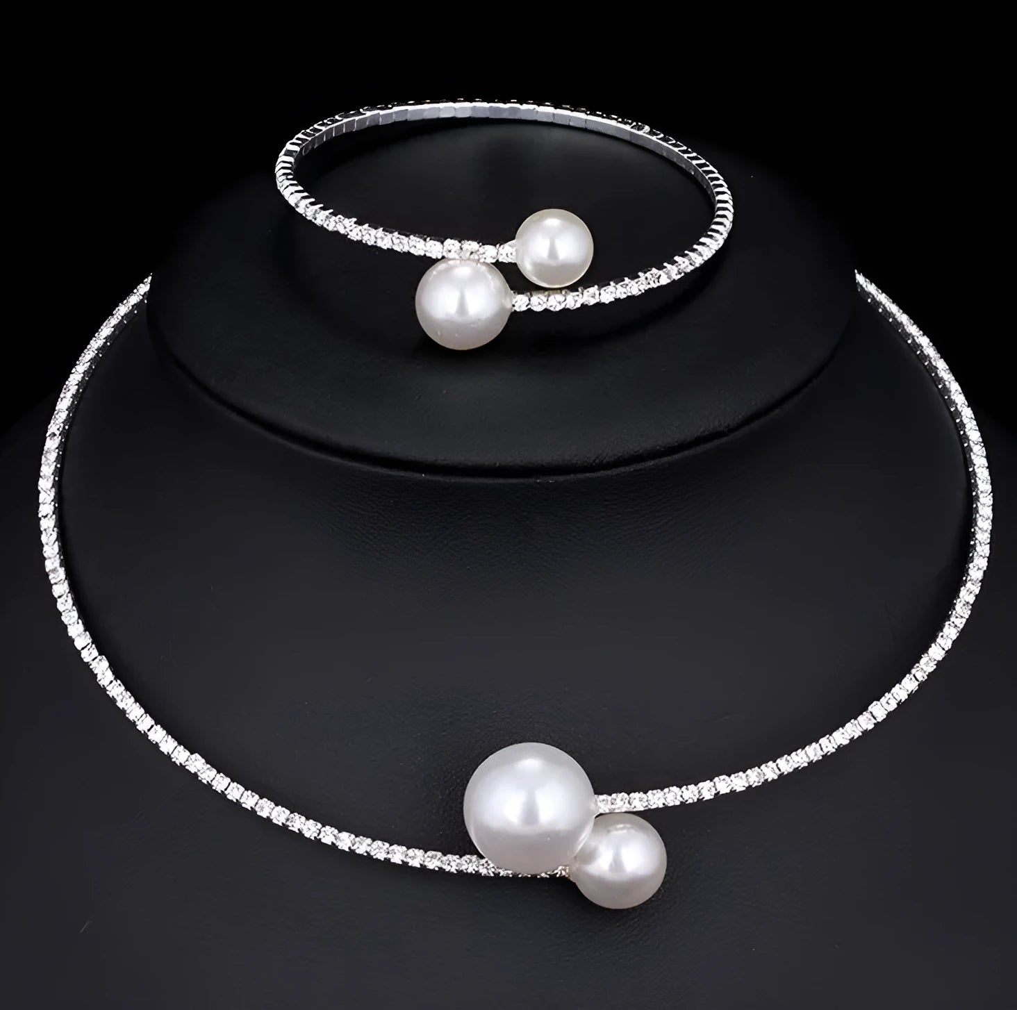 Bridal crystal pearl diamond drill collar necklace and bracelet set in gold and silver tones on white background