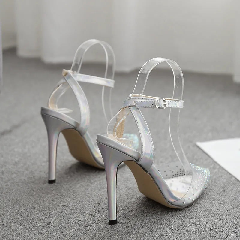 Women's pointed diamond pattern sandals with a stiletto heel, shown in size 38 with a PVC upper.