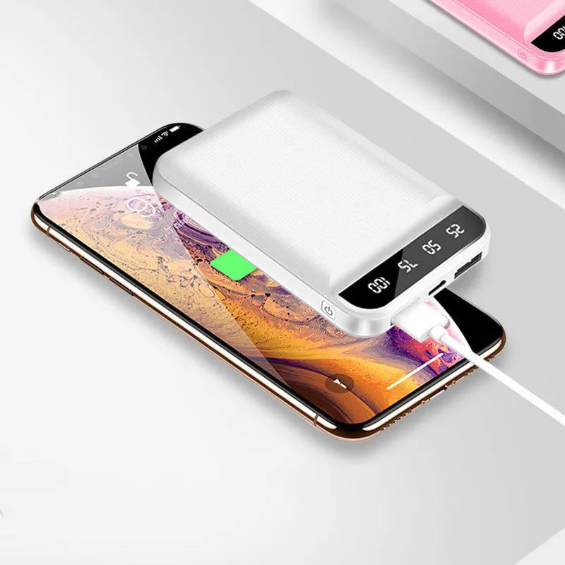 Compact rectangular power bank with multiple USB ports shown in black, blue, pink, and white colour options