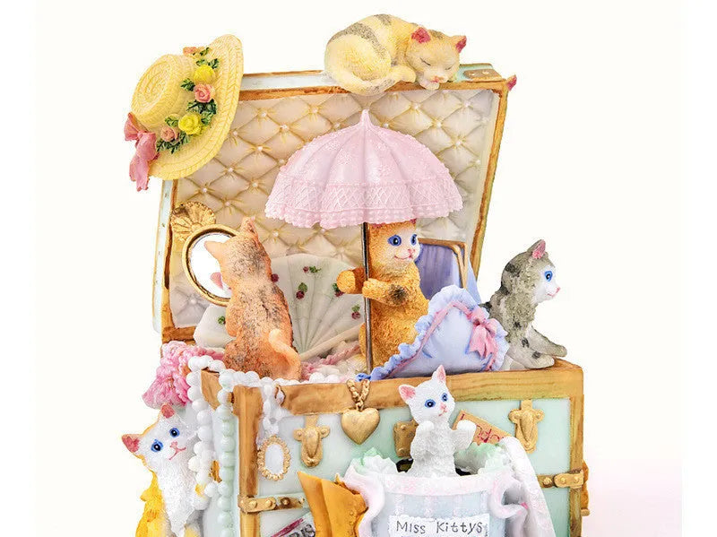 Cold porcelain cat jewellery box music box with rotating snowflakes and light, 18-note Yunsheng movement, 155 x 120 x 170mm