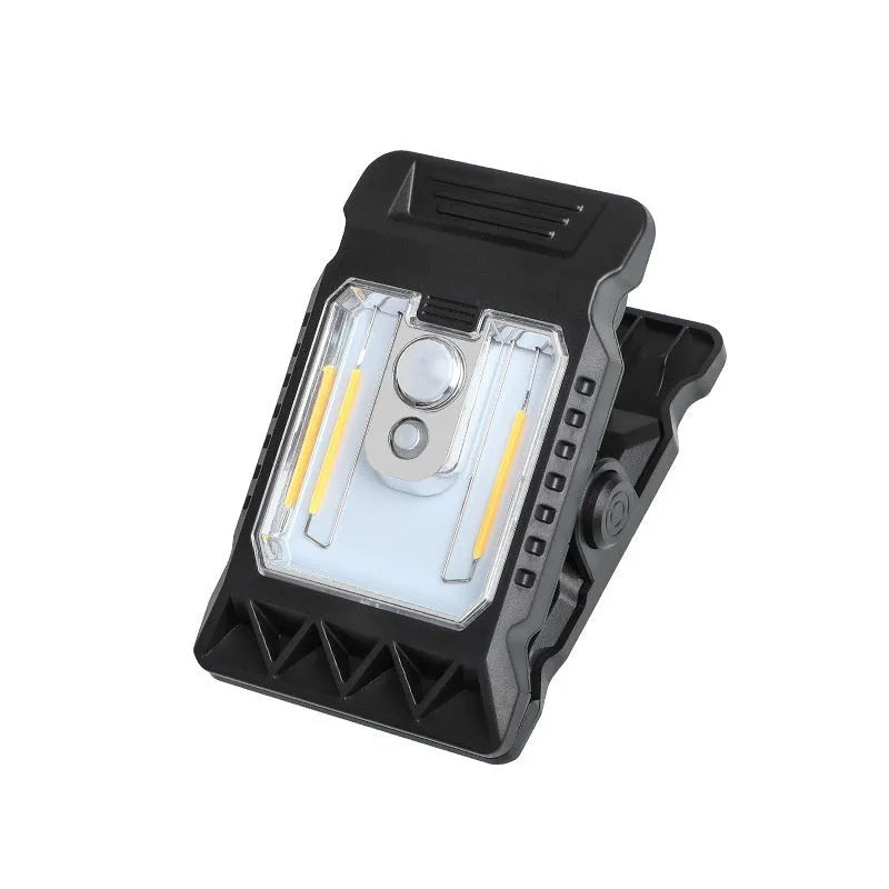 White clip lamp with motion sensor showing dimensions 11.2x7.6cm