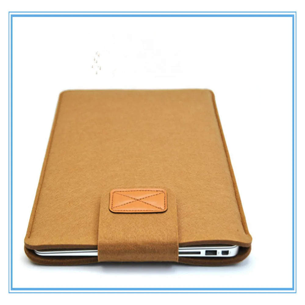 Clamshell laptop bag in khaki, light grey, or dark grey with a woven plush texture and corner protector.