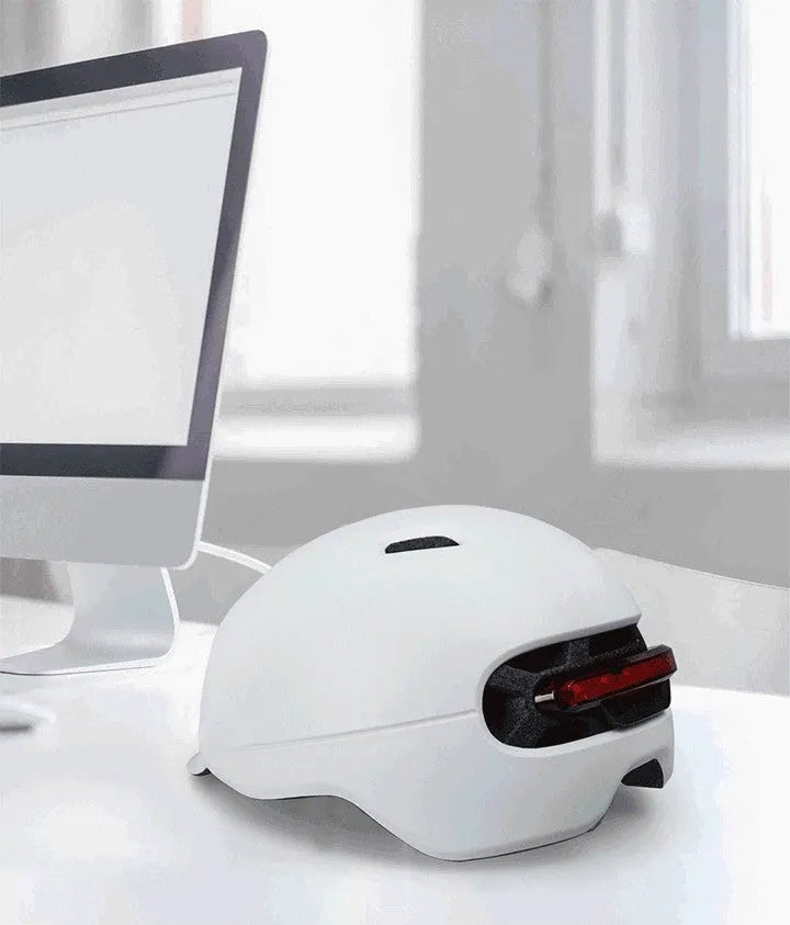 Urban Light Riding Intelligent Helmet in white on a background, side view showing EPS+PC shell construction