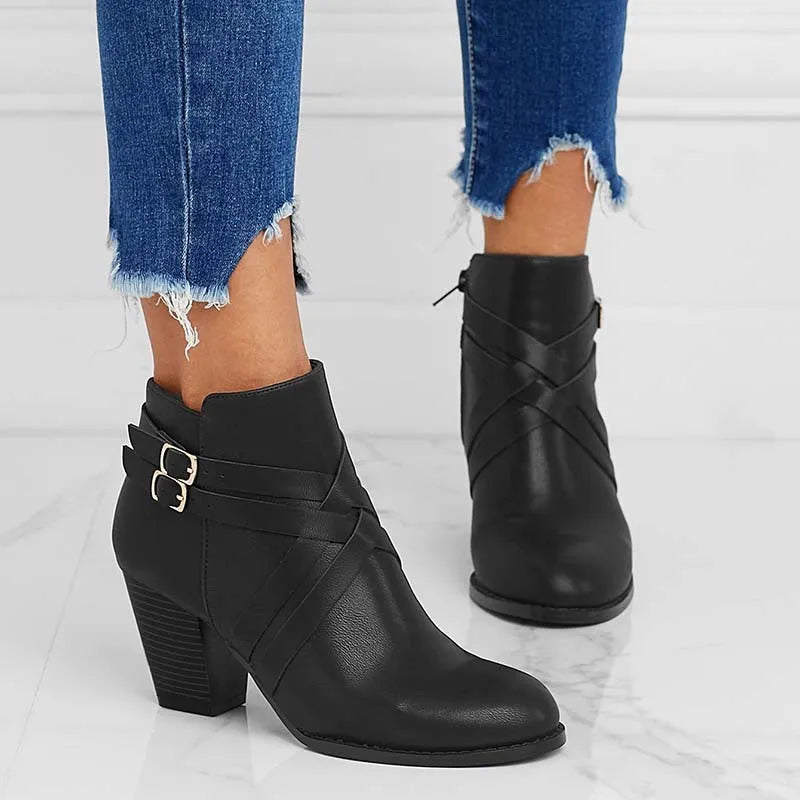 Women's grey PU leather short ankle boot with side zip, buckle strap, and a thick 7cm rubber heel.