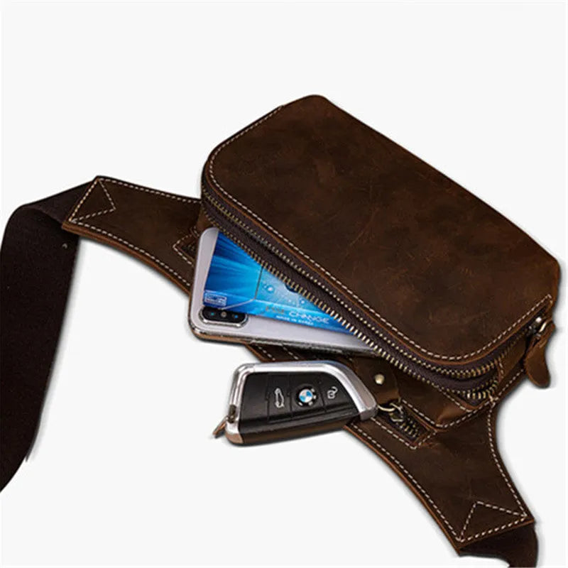Brown cow leather men's sports waist bag with pull closure showing internal phone compartment