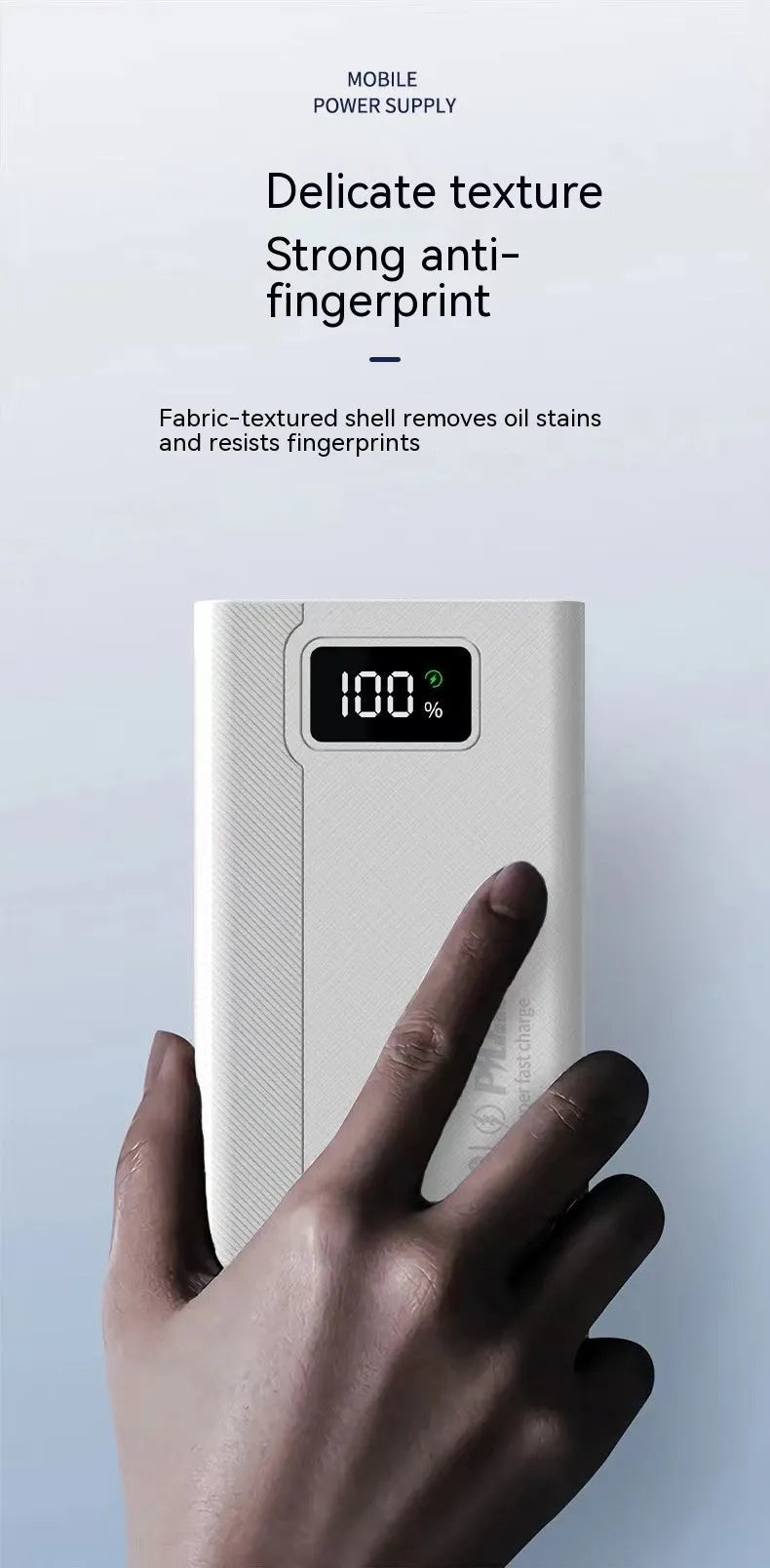 Black and white large capacity power bank with plastic shell showing fast charge support.