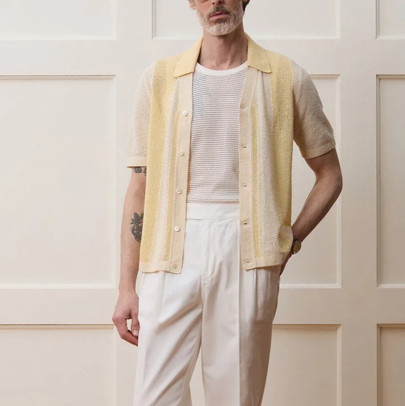Bright yellow hollow-out short-sleeved polo shirt with asymmetrical design on Tencel fabric
