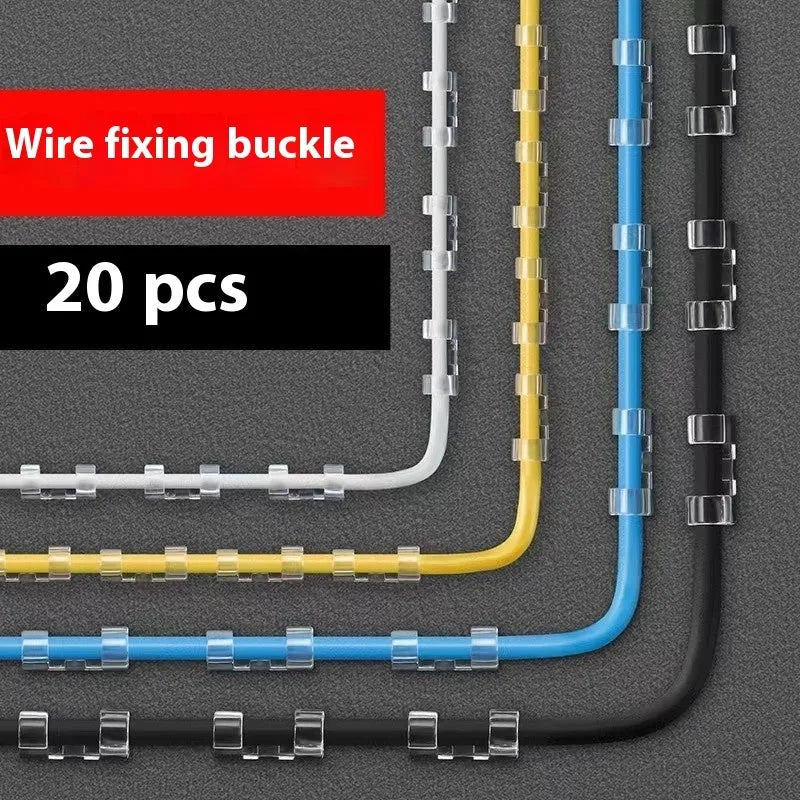 Transparent self-adhesive plastic wire holder snap clips for cable management on a white surface.